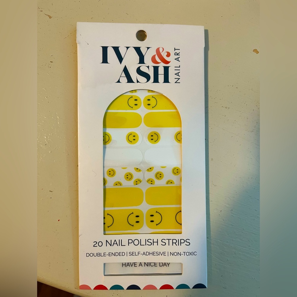 Ivy & Ash smiley face nail art